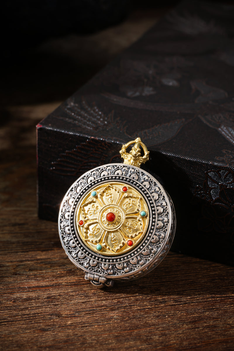 A gawu pendant carrying the six-syllable mantra