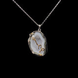 Capricorn crystal geode zodiac pendant with Capricorn symbol, front view