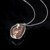 Pisces crystal geode zodiac pendant with Pisces symbol, angled view