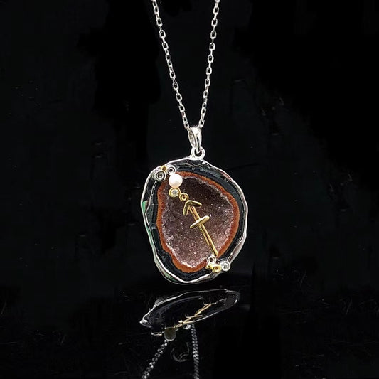 Sagittarius crystal geode zodiac pendant with Sagittarius symbol, front view